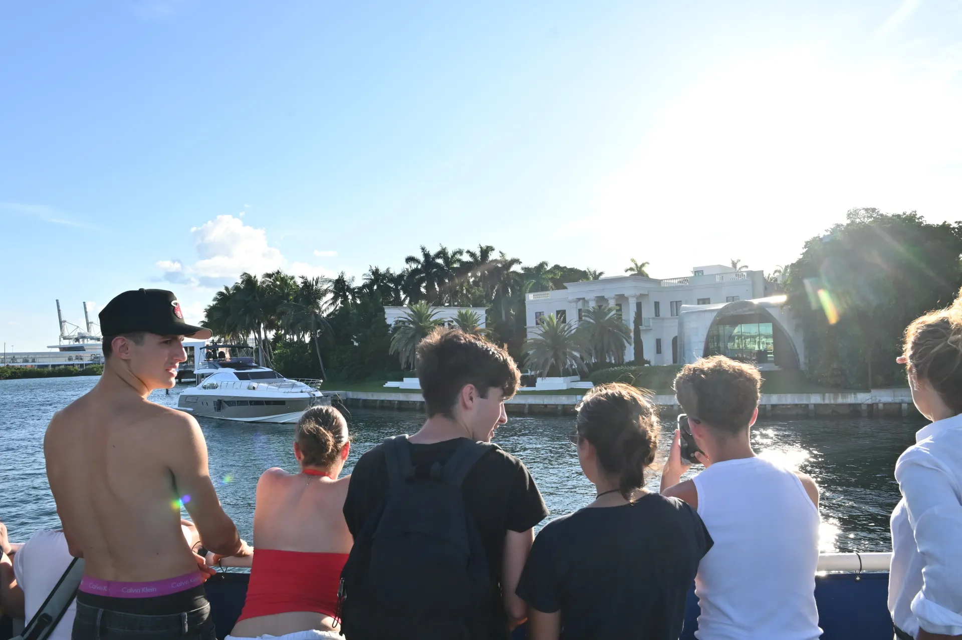 Guests enjoying a limited morning Miami sightseeing cruise special with views of the waterfront mansions.