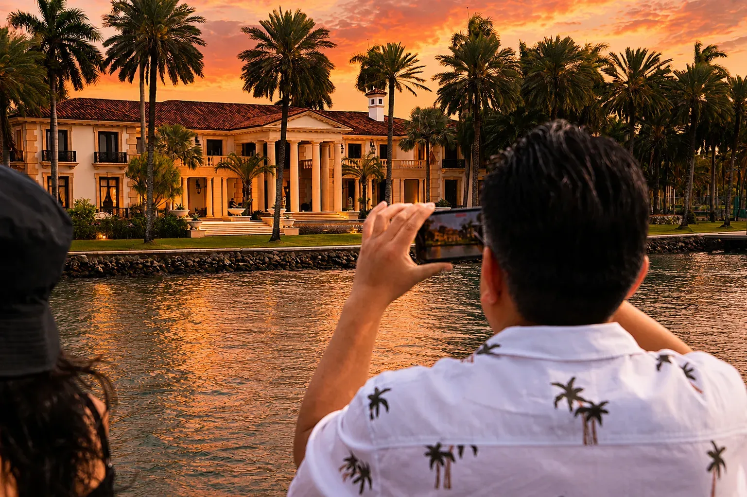 Miami Sunset Mansion Cruise passing luxury waterfront homes in Star Island