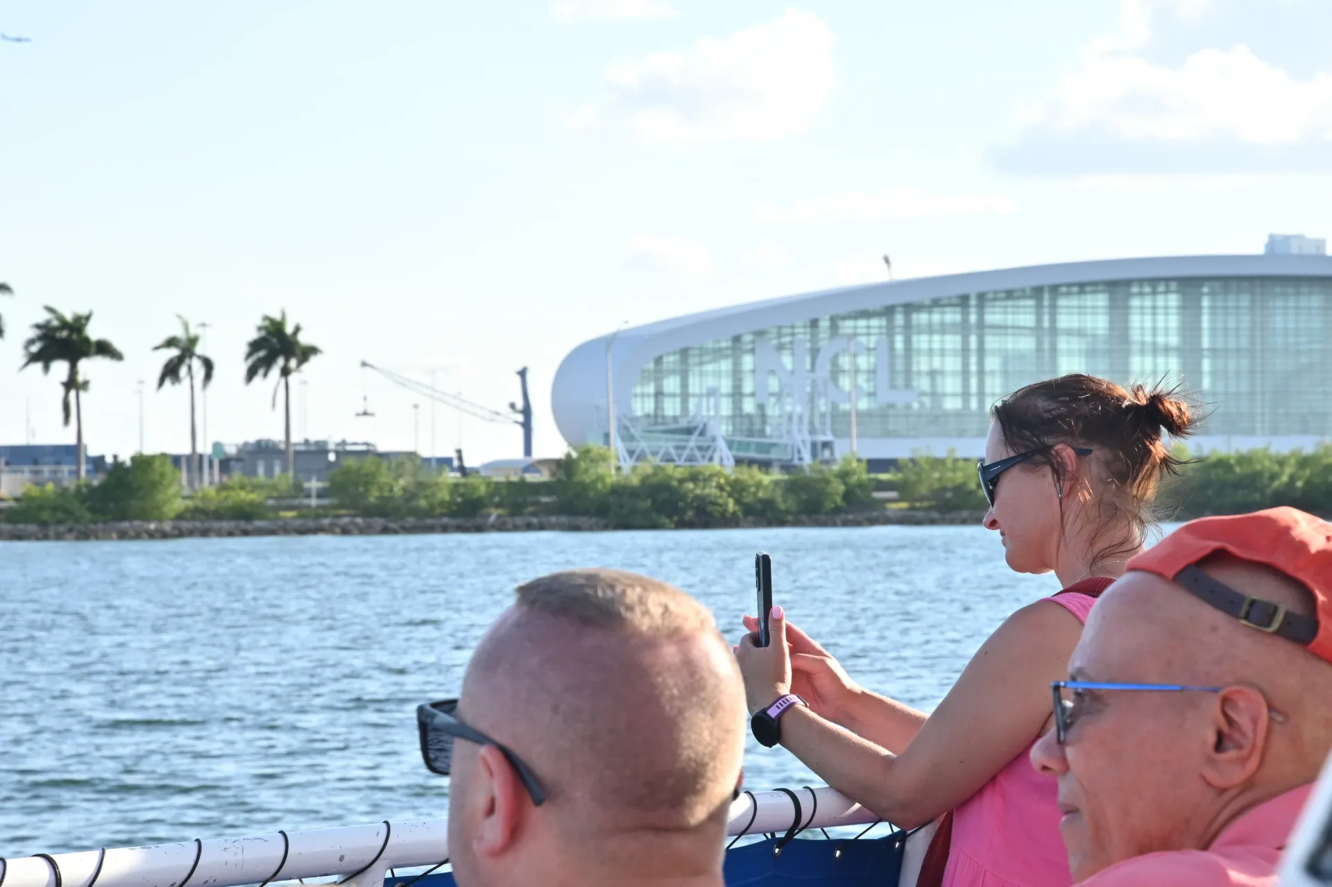 Passengers passing the PortMiami cruise terminal along the Biscayne Bay boat tour route on the way to Star Island.