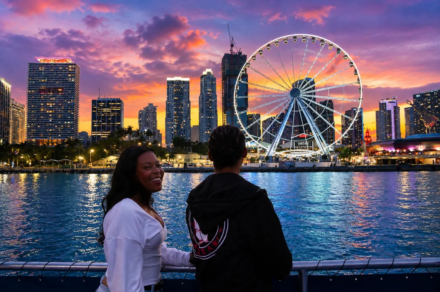 Couples enjoying a Sunset Cruise Miami experience with Bayside skyline views during golden hour