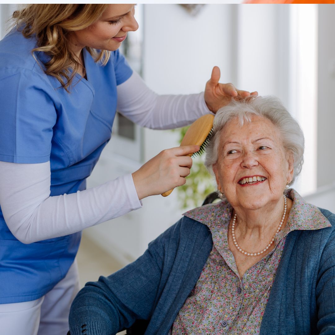 Old lady and nurse reading a book together