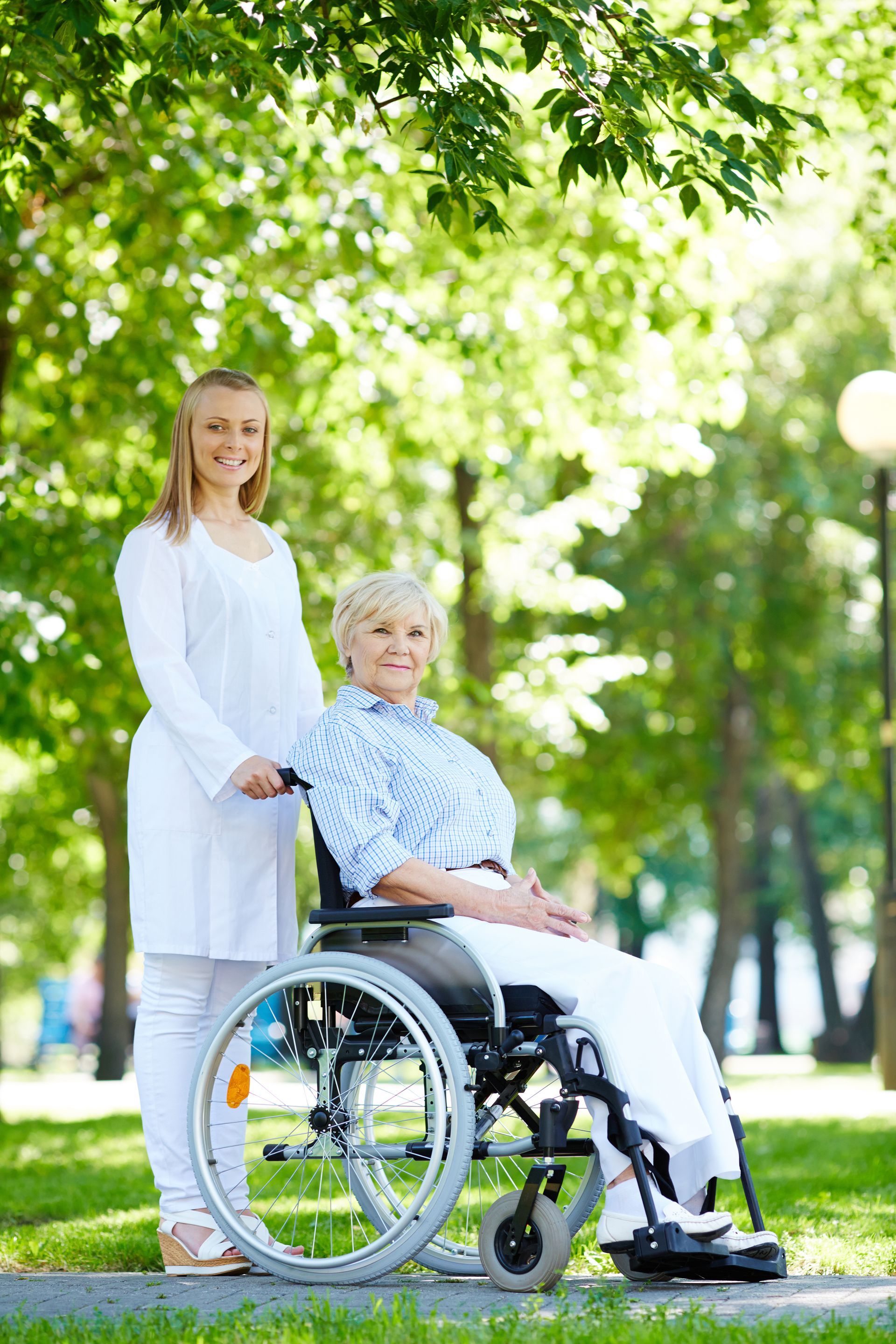 Old woman going out with caretaker