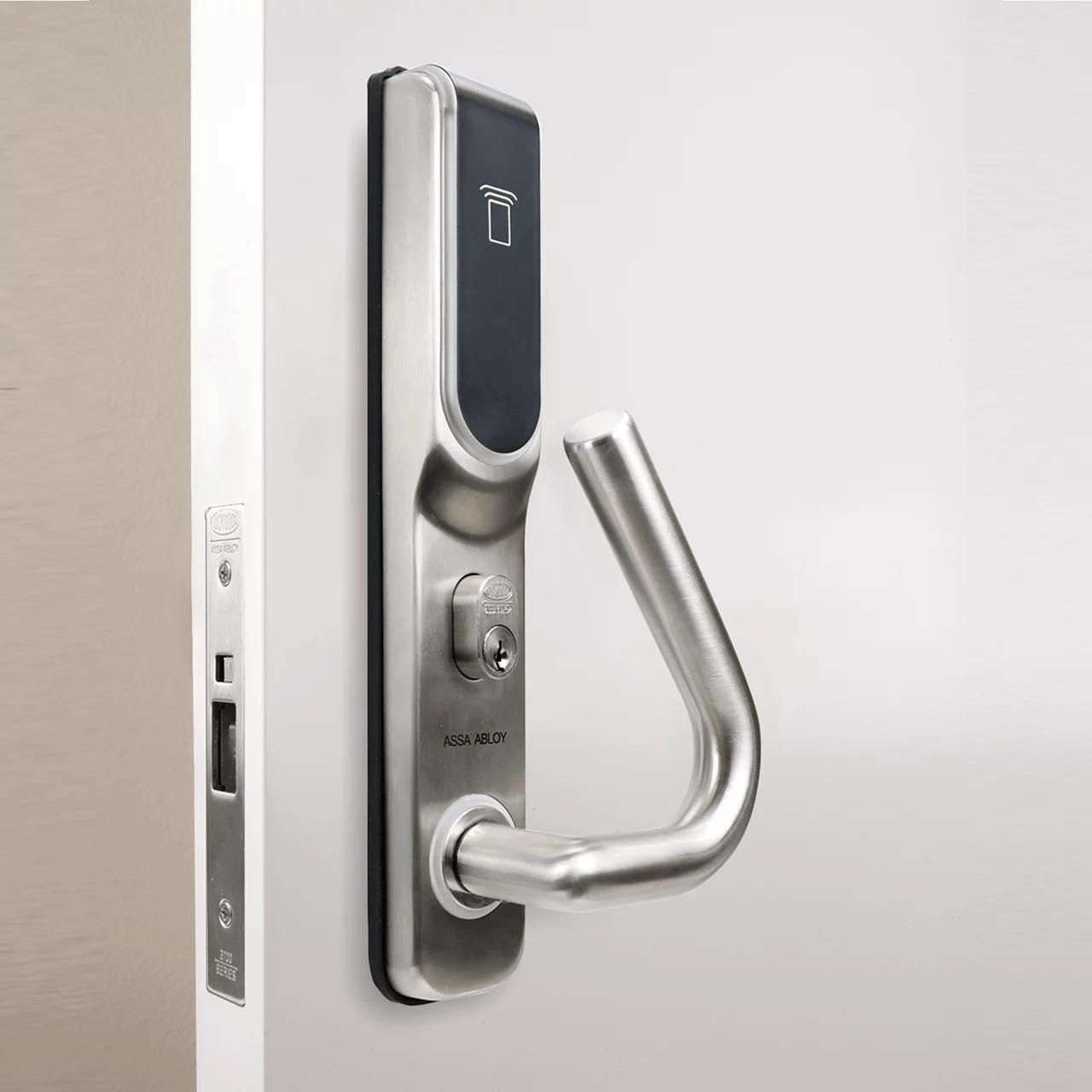 A Close up Of a Stainless Steel Door Lock on A White Door — Coast & Hinterland Mobile Locksmiths In Noosaville, QLD