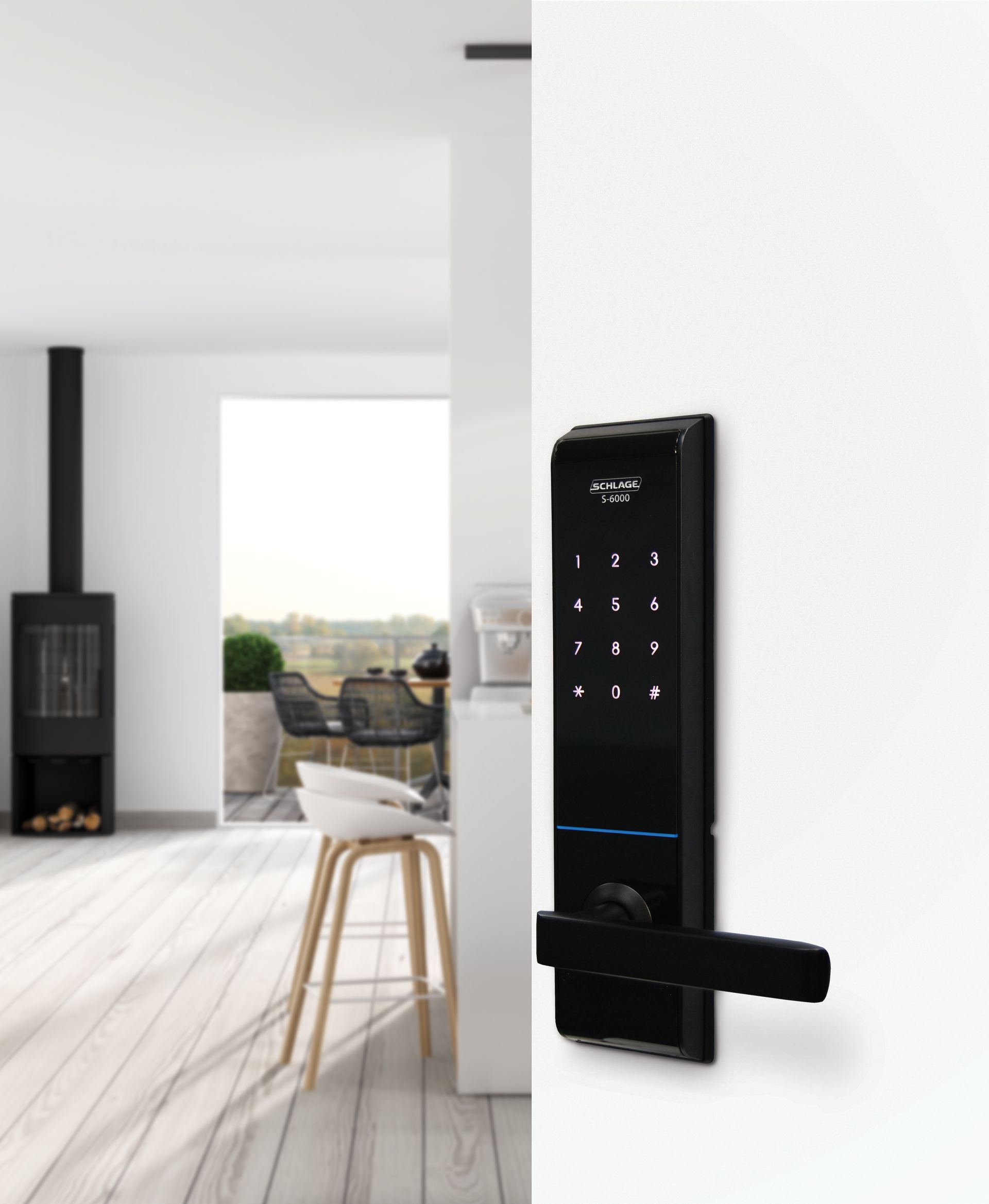A Person is Installing a Door Lock on a White Door — Coast & Hinterland Mobile Locksmiths In Noosaville, QLD