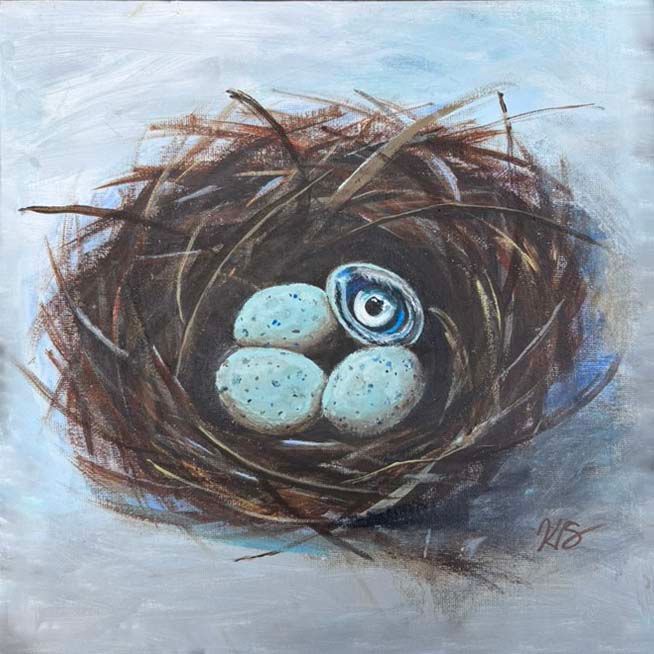 Blue bird egg peeking from a brown twig nest on a pale blue background