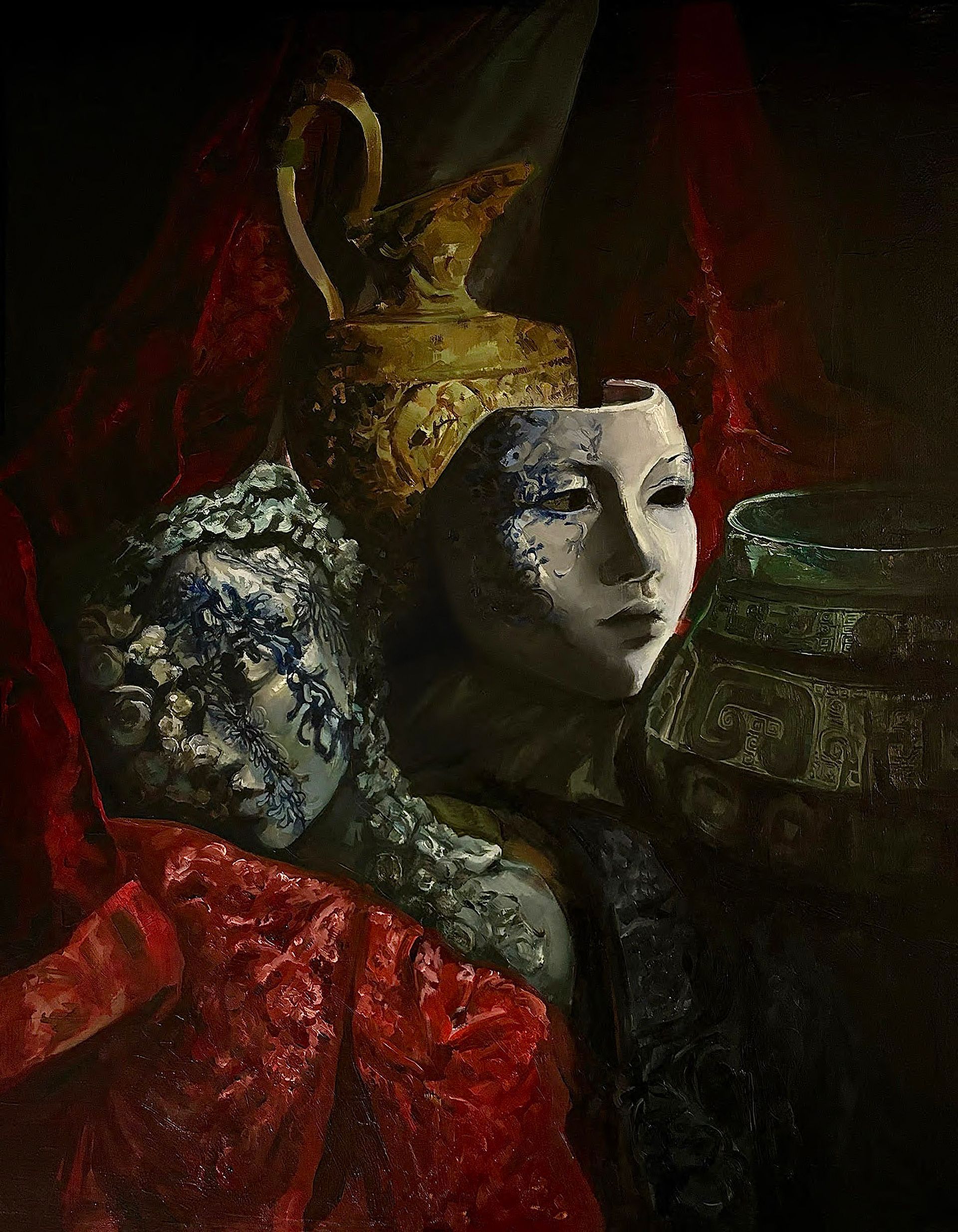 Two ornate masked figures in red and gold against a dark background