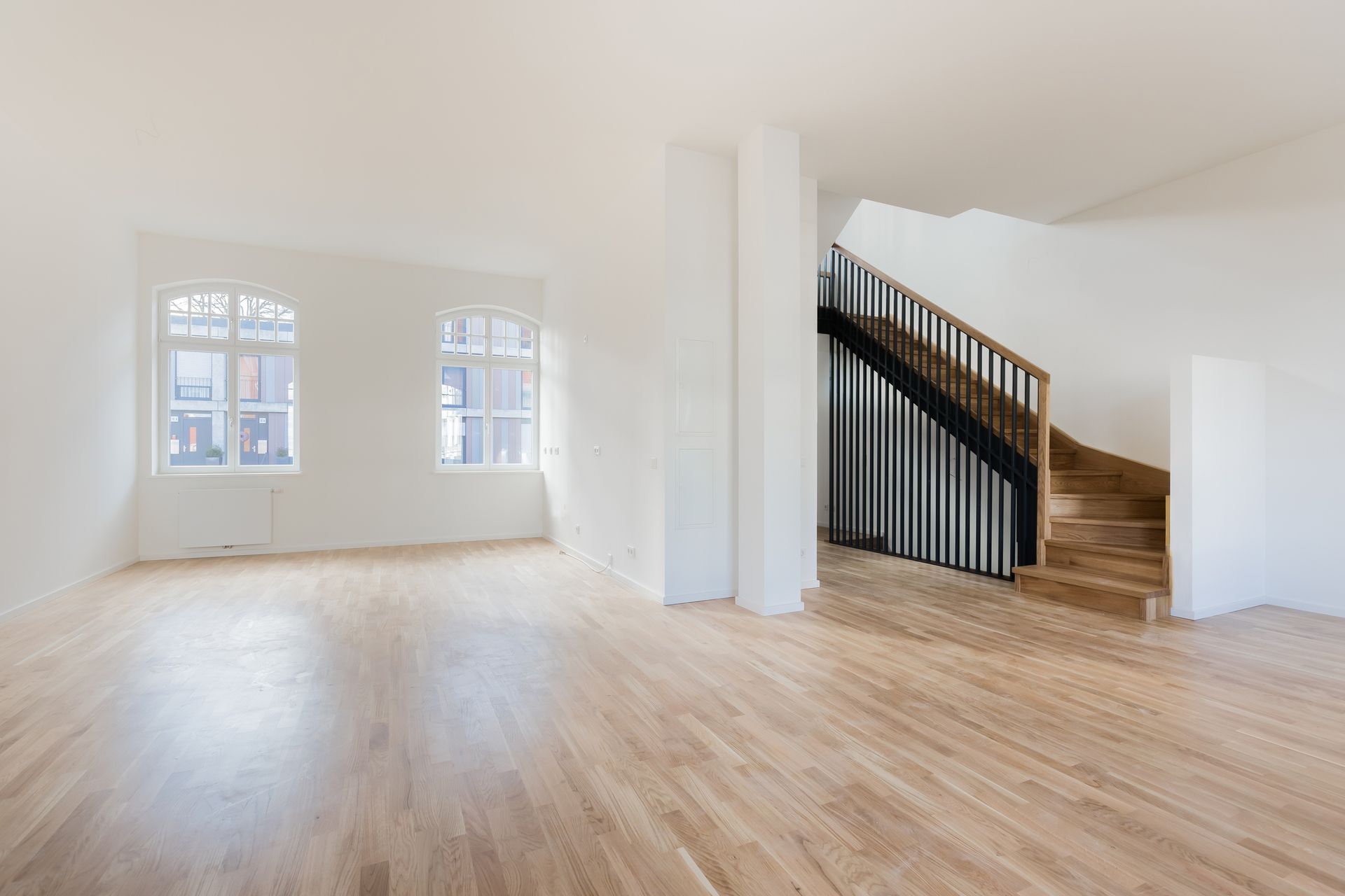 Empty Living Room With Hardwood Flooring – Easley, SC – Action Flooring LLC