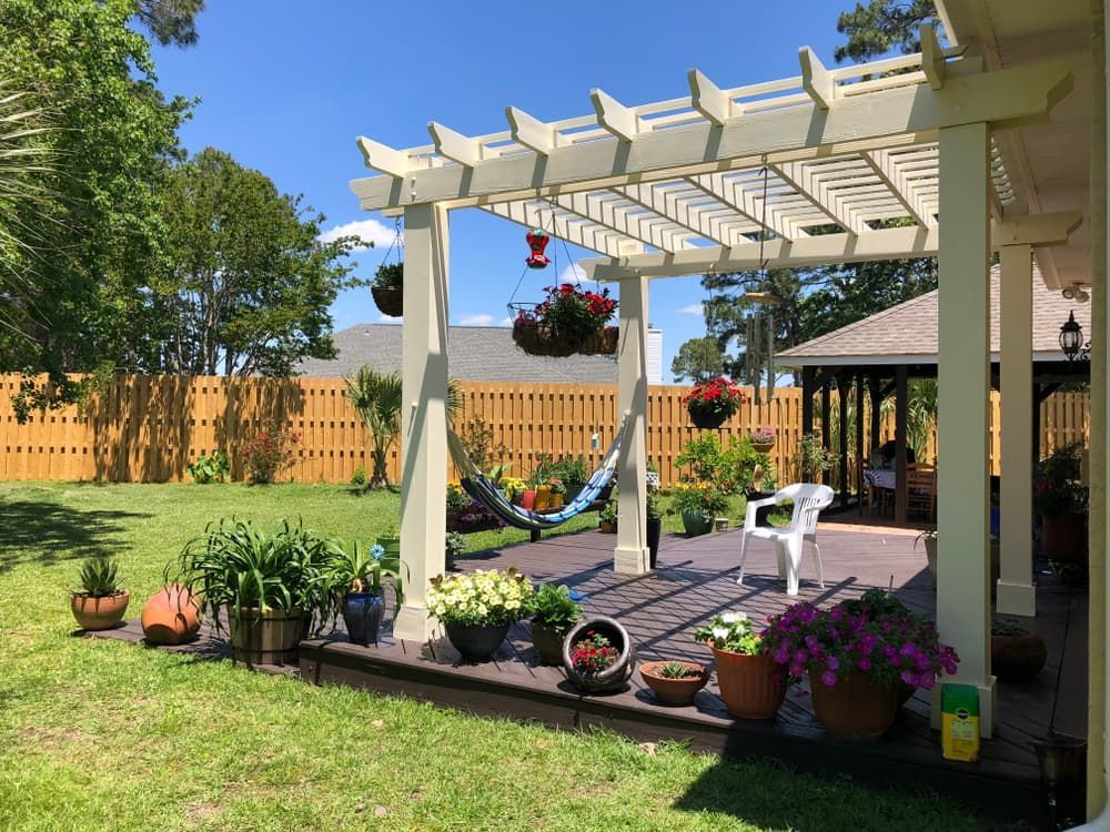 A Backyard with A Pergola and A Hammock — Green Vision NT in Virginia, NT