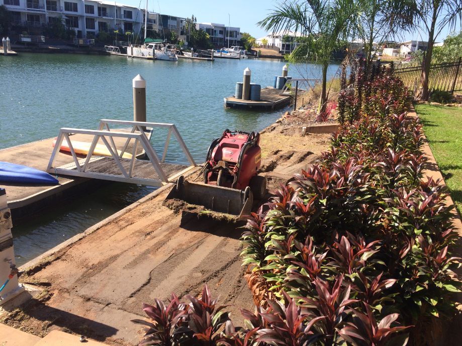 A Boat Is Docked at A Dock Next to A Body of Water — Green Vision NT in Virginia, NT