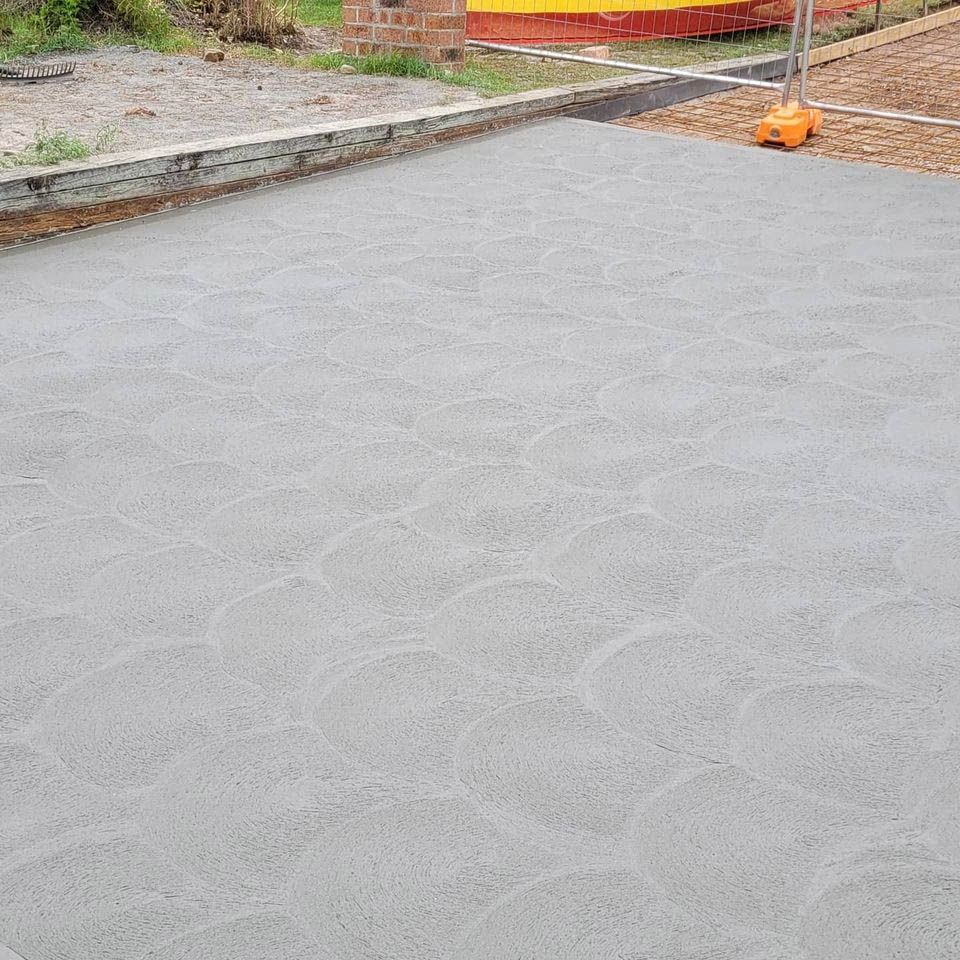 A Concrete Driveway is Being Built — Dave Smith Concrete in Salt Ash, NSW