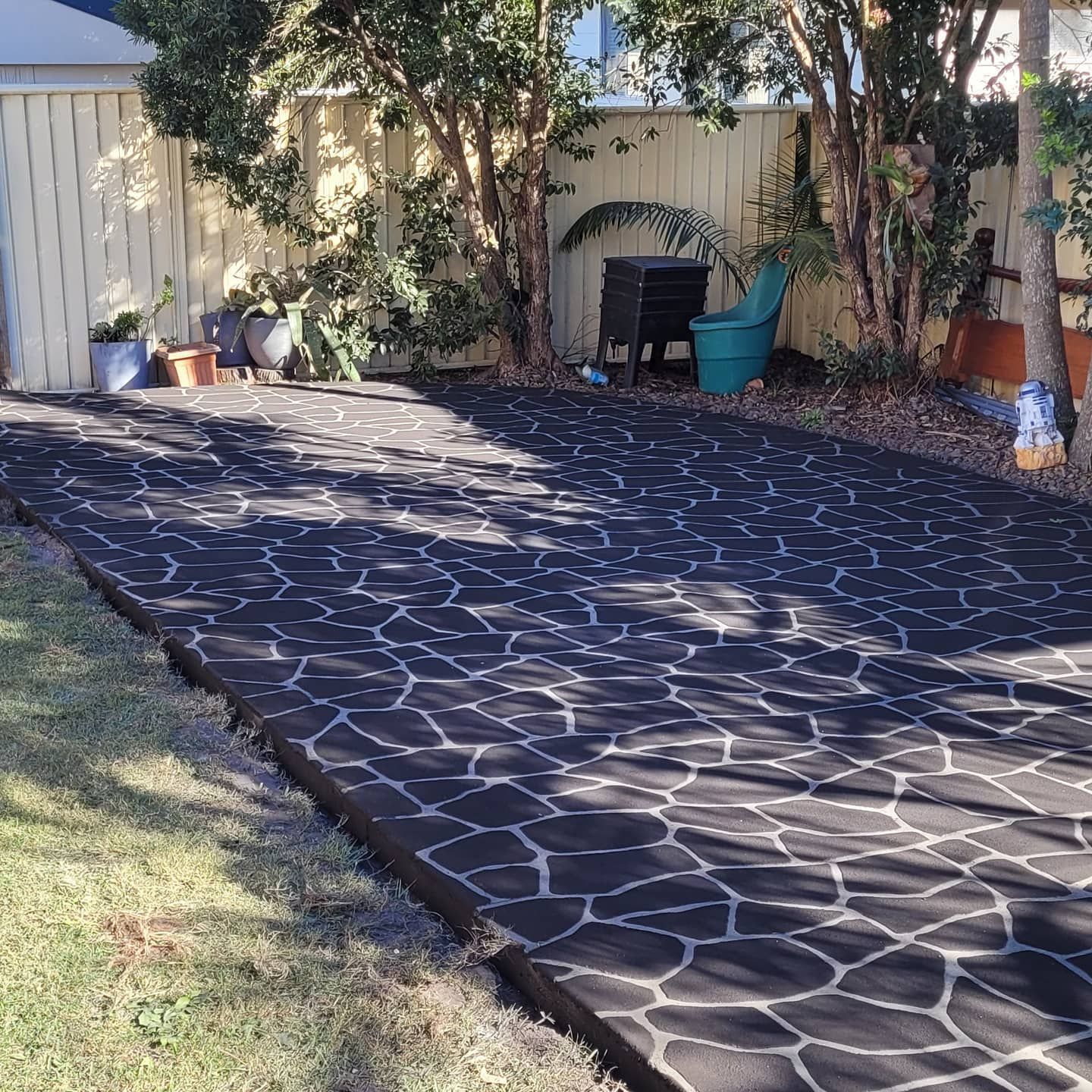 A Concrete Walkway is Being Built in Front of a House — Dave Smith Concrete in Lemon Tree Passage, NSW