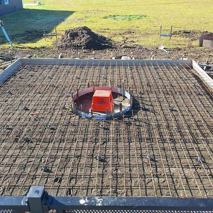 A Construction Site With a Red Box in the Middle of It — Dave Smith Concrete in Port Stephens, NSW