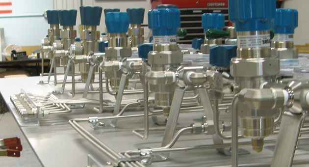 A bunch of valves are sitting on a table