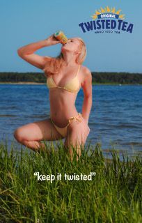 Woman kneeling in water drinking from a bottle, with Twisted Tea logo and “keep it twisted” text.