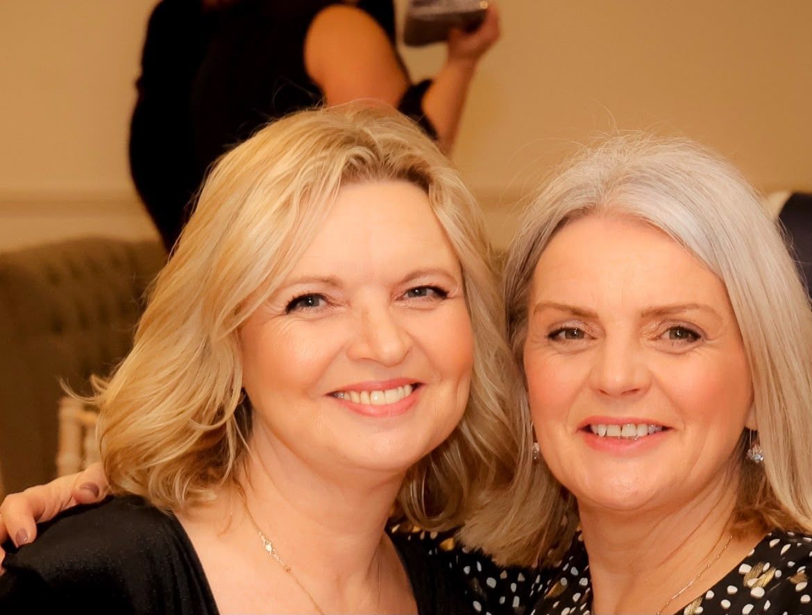Client wearing a natural-looking blonde wig from The Roche Hair Experience in Stafford.