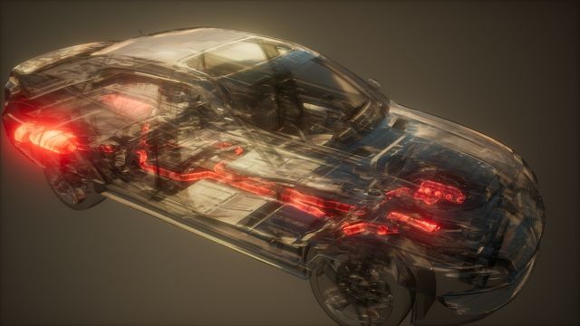 It shows the inside of a car with red lights on.