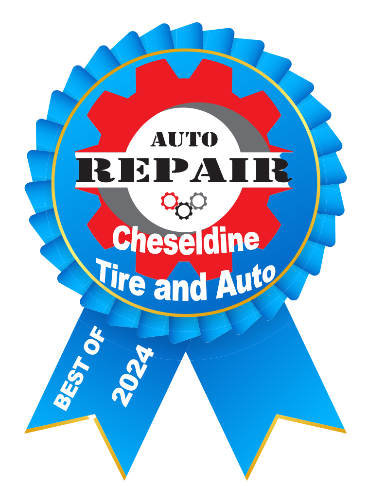 A blue ribbon that says auto repair cheseldine tire and auto