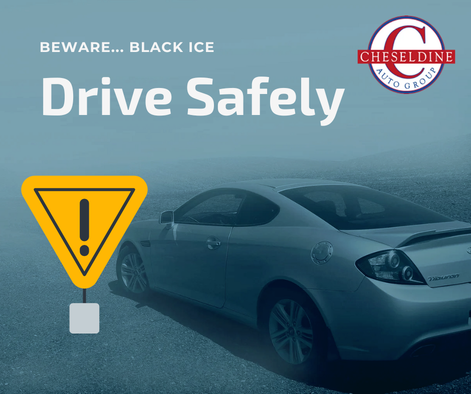 A sign that says drive safely next to a car