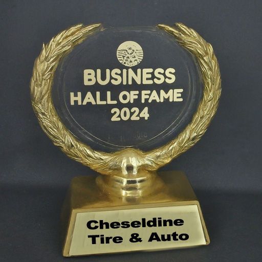 A business hall of fame trophy for cheseldine tire and auto