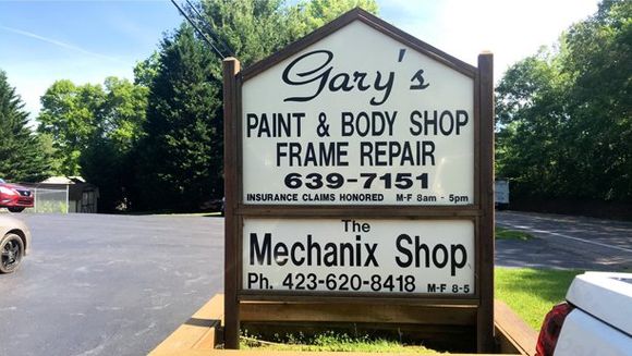 The Sign Advertises Two Businesses