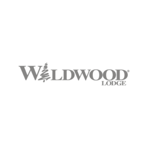 Wildwood Lodge logo in gray text with a pine tree forming the “I”