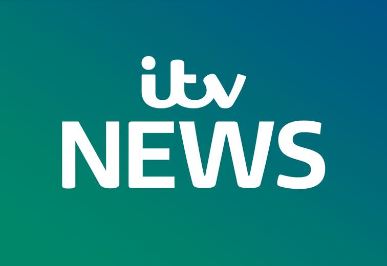 A logo for itv news on a blue background