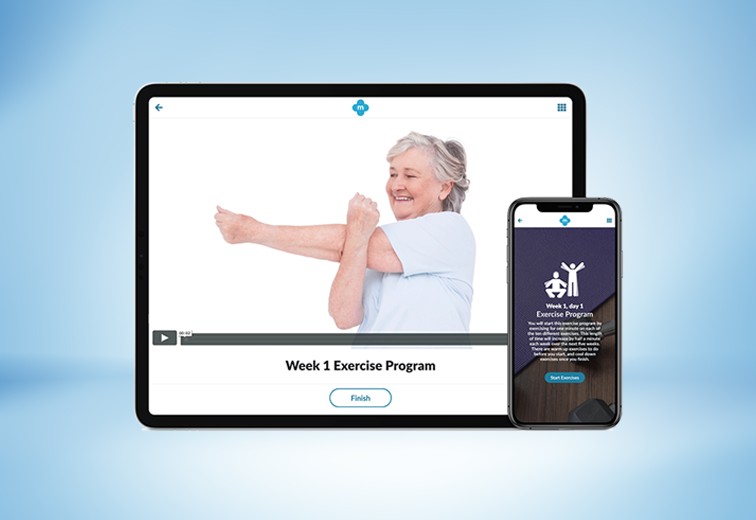 An older woman is stretching her arms on a tablet next to a cell phone.