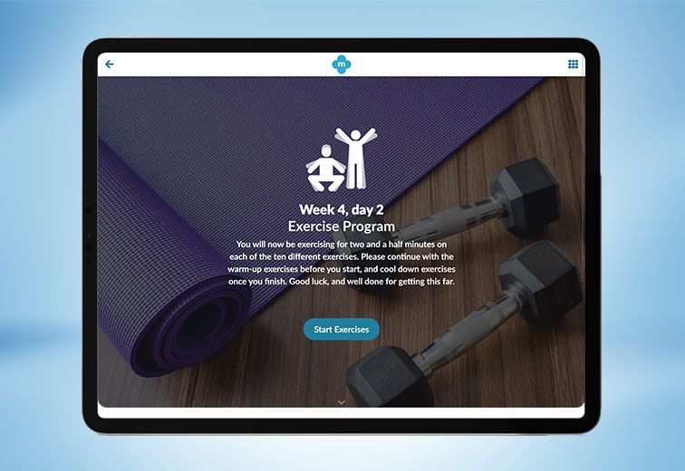 A tablet with a yoga mat and dumbbells on it