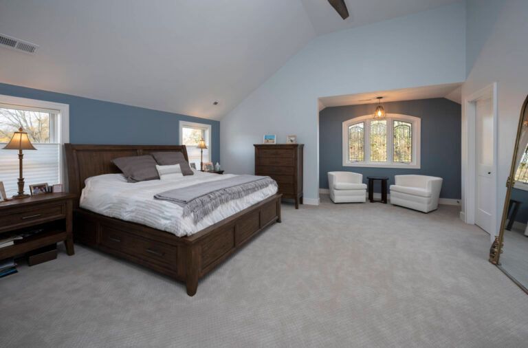 There is a large bed in the middle of the room.