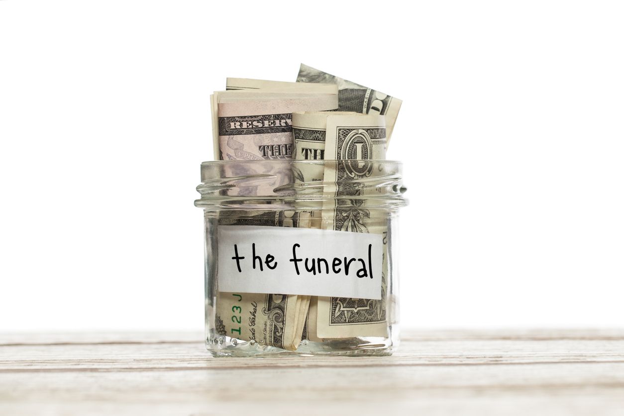 jar with money for a funeral