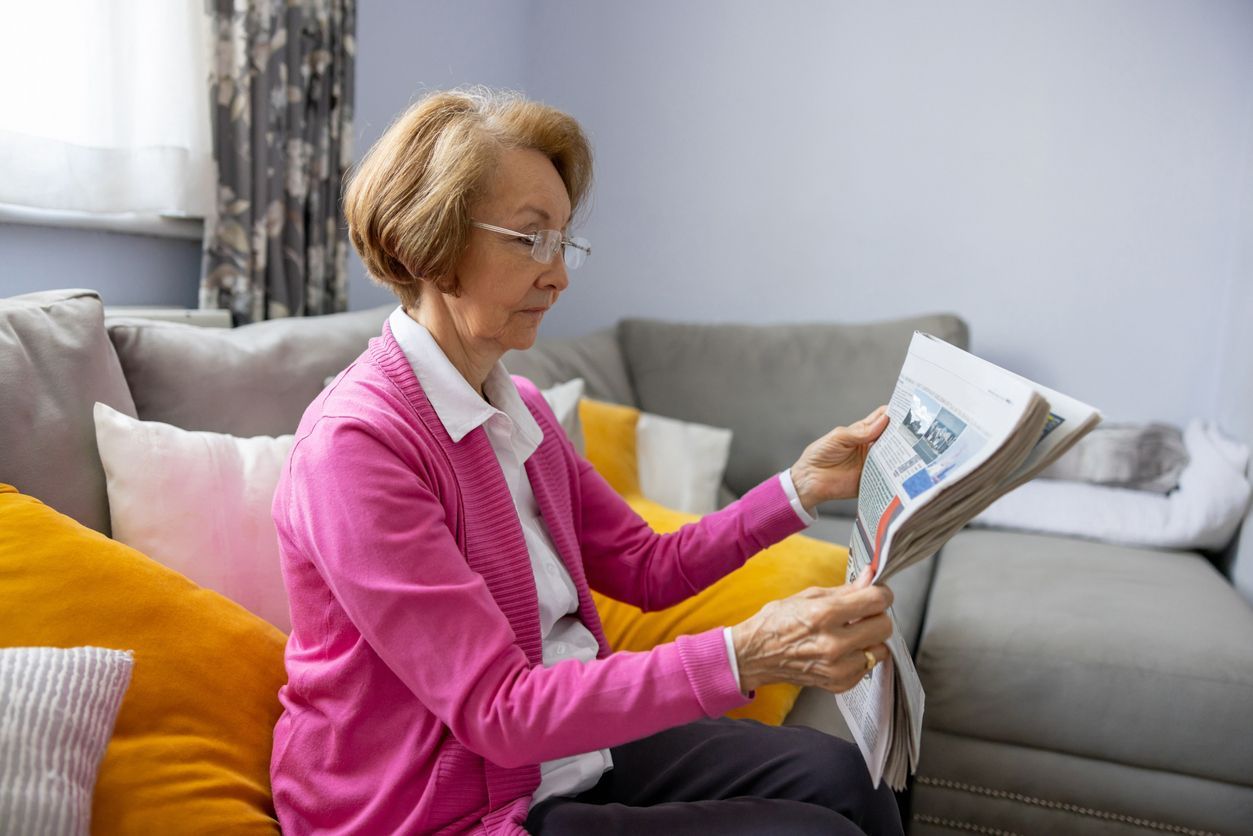 funeral director and elderly couple going over processes