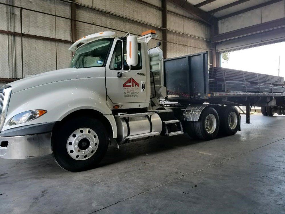 Truck Delivering Steel — Dallas, TX — Cardinal Metals Inc