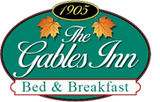 Logo for The Gables Inn Bed & Breakfast, with green oval and 1905 date. Features maple leaves and script text.