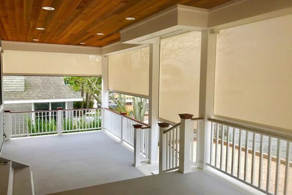 Sunesta retractable screens covering and outdoor deck.