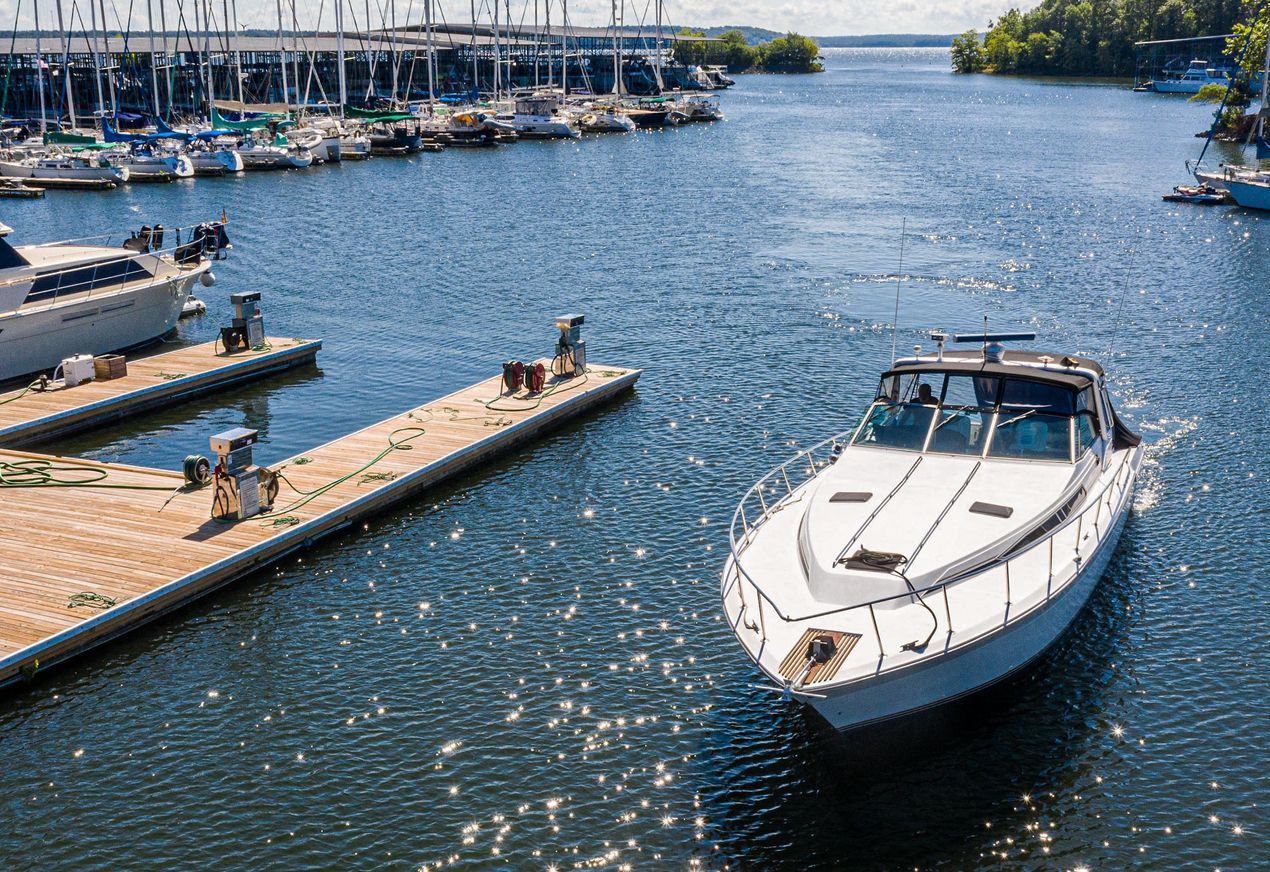 An aerial view of a boat docked at a marina.
