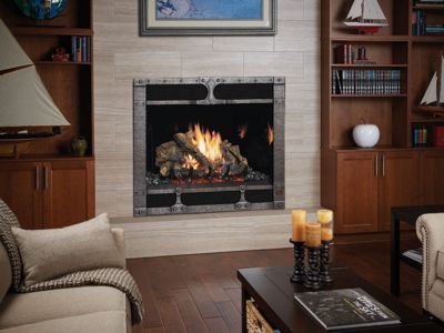 A living room with a fireplace and a couch