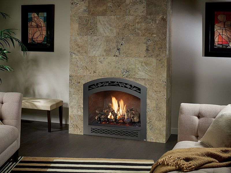 A living room with a fireplace and a couch