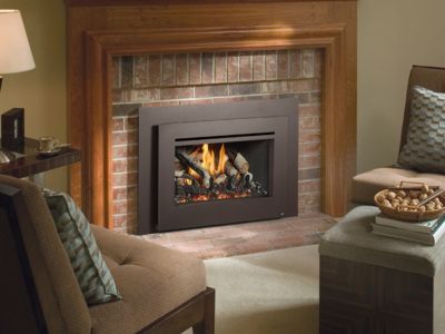 A living room with a fireplace and a chair