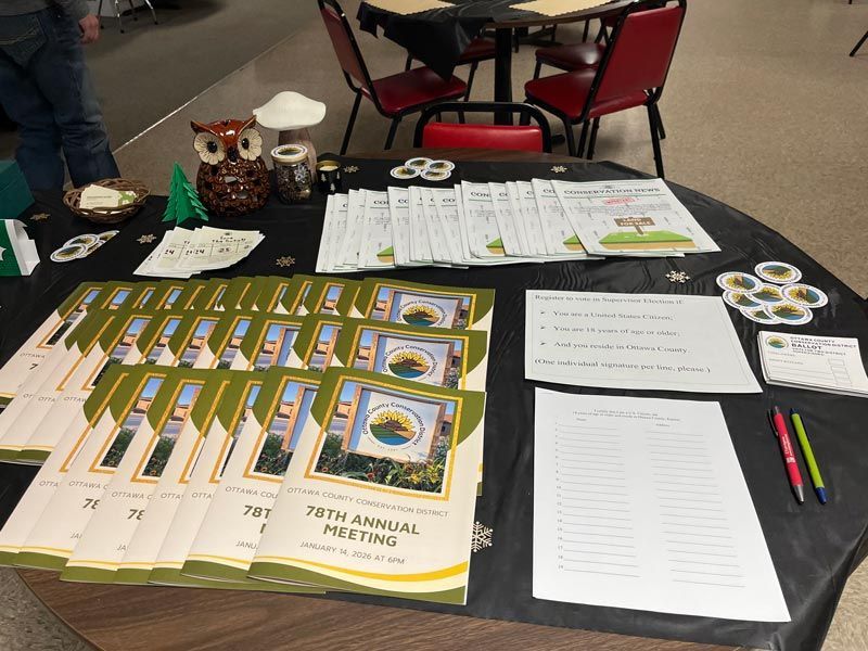 brochure handouts stacked neatly on a table