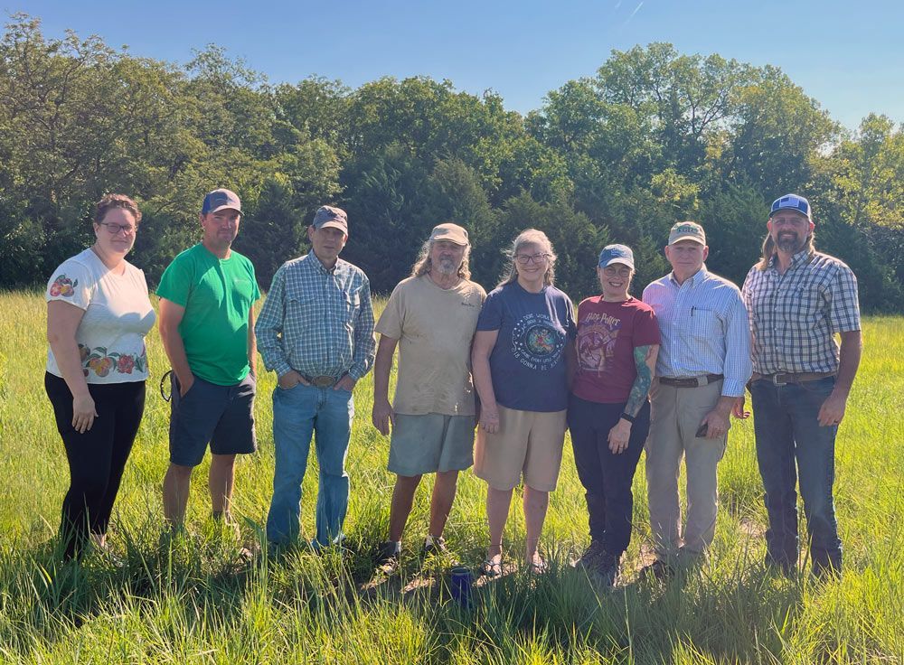 group photo a people standing in a field