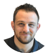 Headshot of Alex Alexakis