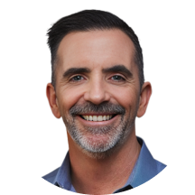 Headshot of Corey Quinn