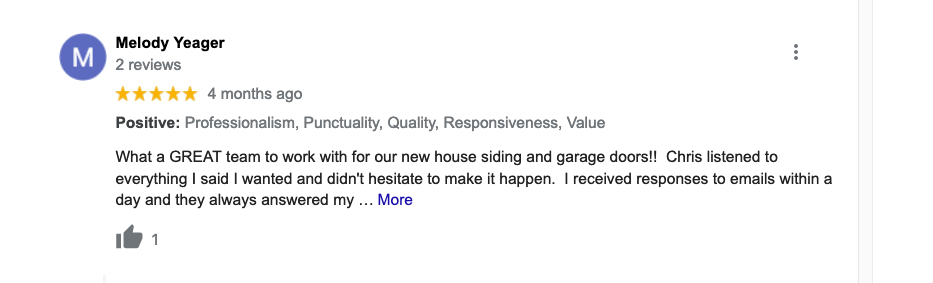 A blurred image of a google review with a thumbs up.