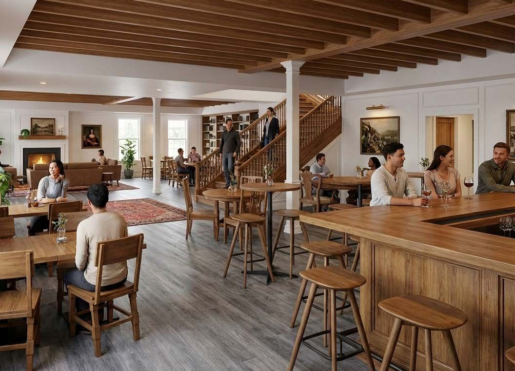 An indoor tavern or lounge with wooden furniture, a central bar, tables, seating, and a staircase in a bright, open space.