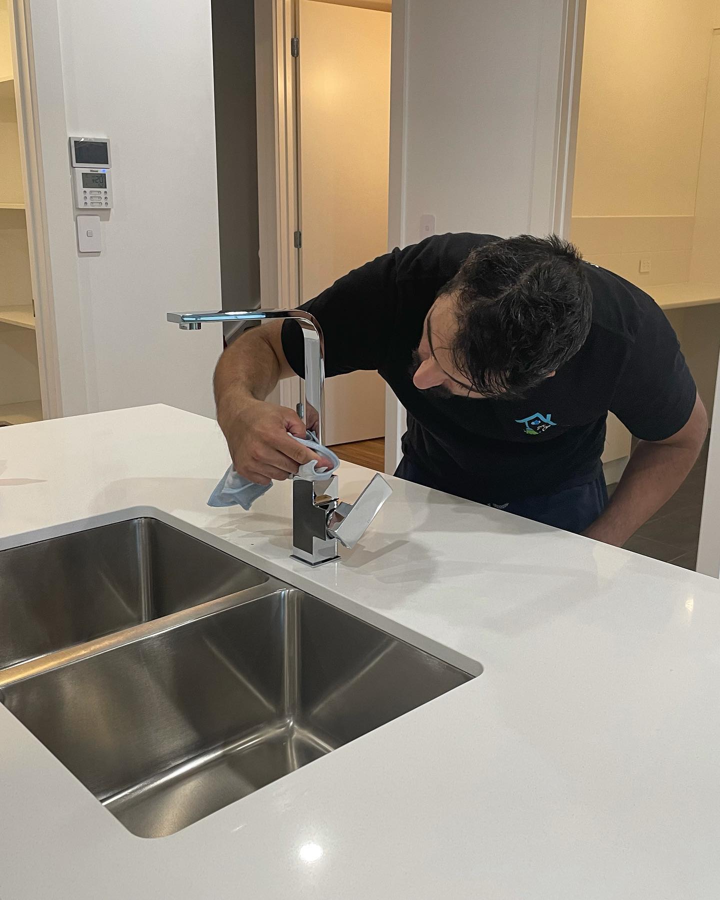 Woman Cleaning Kitchen Drawers — Adelaide, SA — Super Carlo's Cleaning Services Woman Cleaning Kitchen Drawers — Adelaide, SA — Super Carlo's Cleaning Services