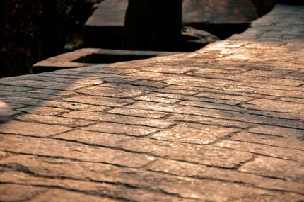 Stamped concrete made to look like bricks.