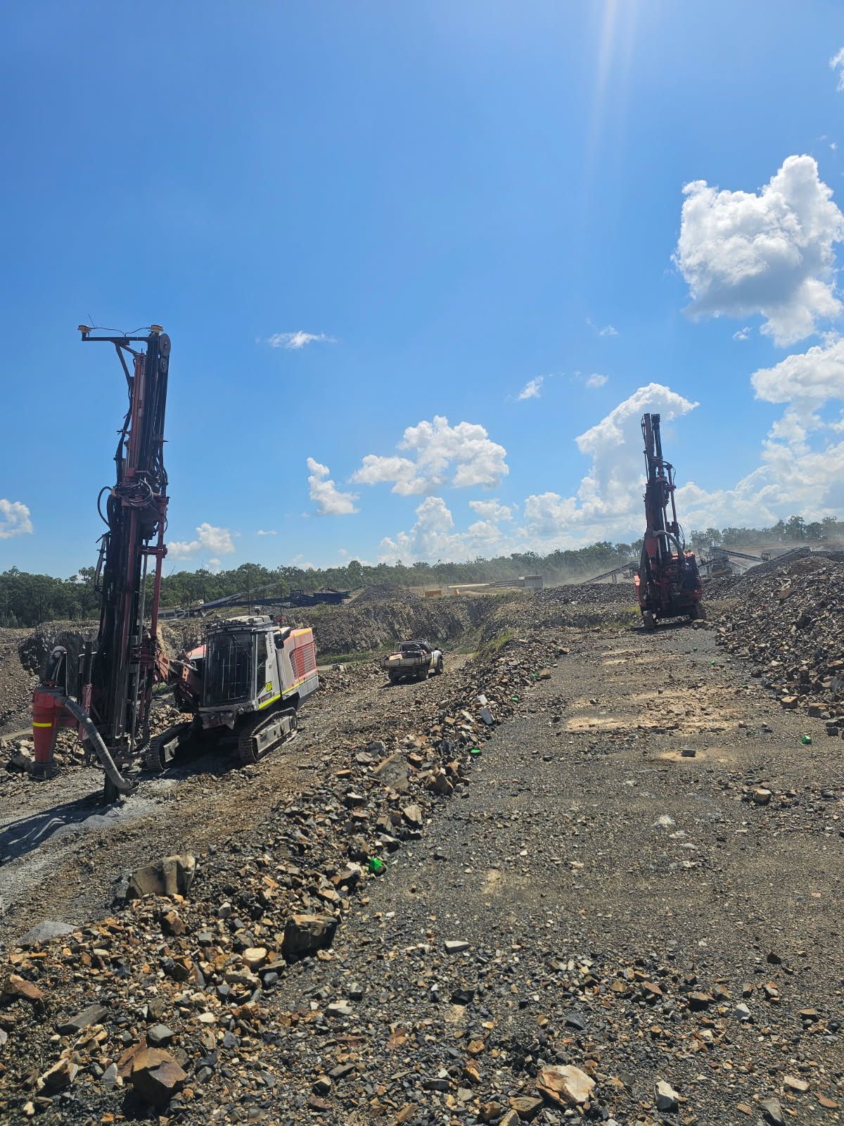 A large excavator is working on a construction site.