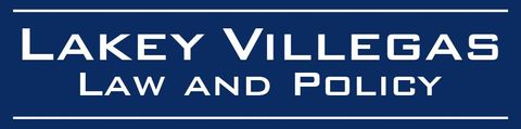A blue sign that says lakey villegas law and policy