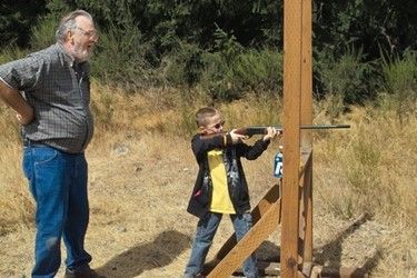 Senior Teaching A Young Boy — Tacoma, WA — Pheasants Forever Senior Teaching A Young Boy — Tacoma, WA — Pheasants Forever