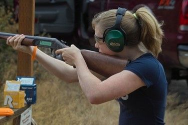 Young Lady Holding A Gun — Tacoma, WA — Pheasants Forever Young Lady Holding A Gun — Tacoma, WA — Pheasants Forever